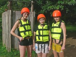 Girls in rafting gear in