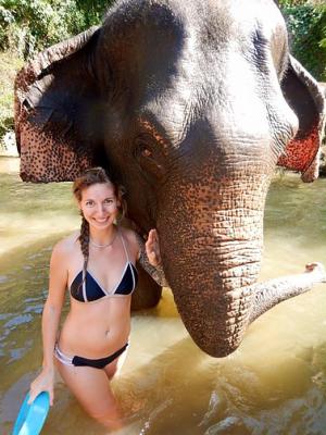 Girl under elephant head