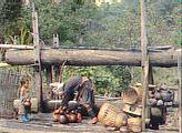 Hilltribes taking water at spring, Chiang Mai, Thailand