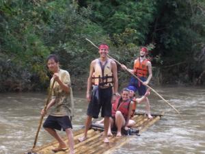 Bamboo rafting on a jungle stream